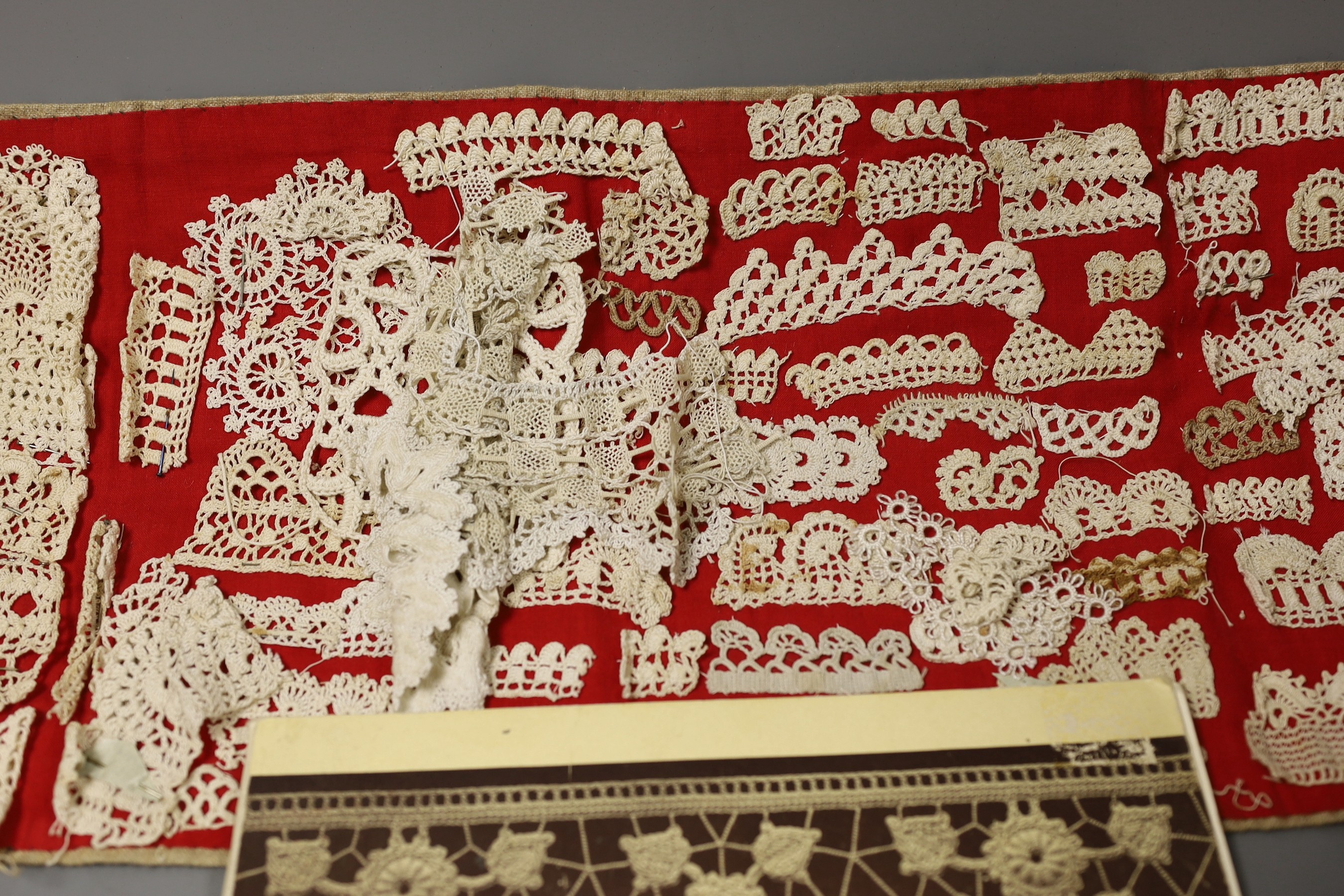 A collection of different crochet worked motifs and panels together with the DMC Library crochet work book